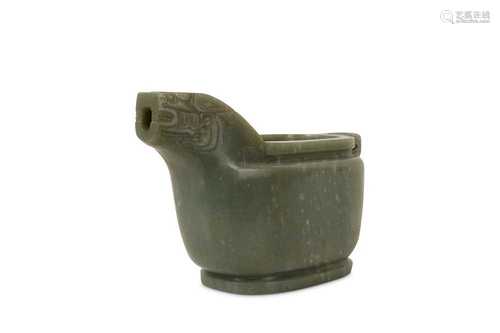 A CHINESE PALE CELADON JADE ARCHAISTIC POURING VESSEL