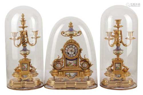 A GILT METAL AND SEVRES STYLE PORCELAIN CLOCK GARNITURE, LAT...