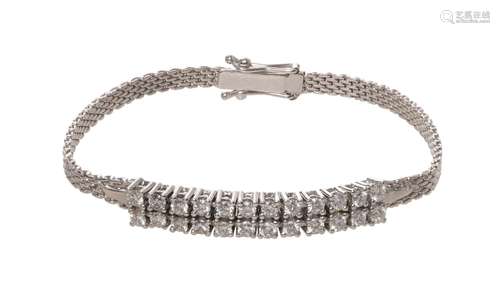 An 18ct white gold bracelet set with 24 brilliant-cut diamon...