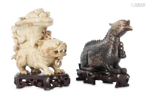 TWO CHINESE CHICKEN BONE JADE 'MYTHICAL BEAST' CARVINGS.