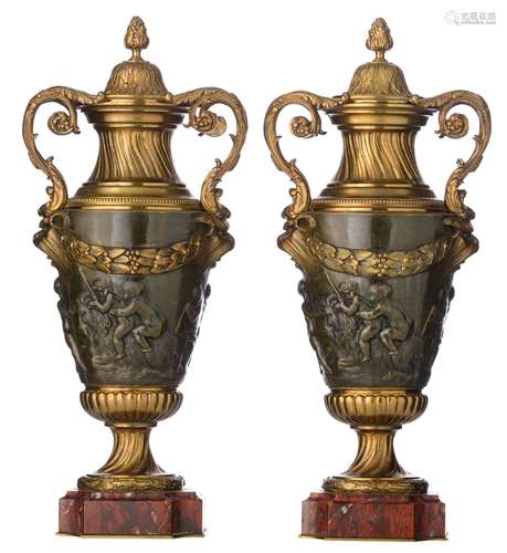 A pair of Neoclassical bronze vases, decorated with a basso-...