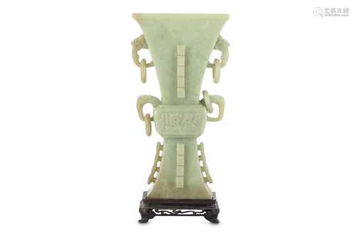 A CHINESE PALE CELADON JADE ARCHAISTIC VASE, GU.