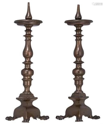 A pair of Italian Baroque bronze pricket candlesticks, 17thC...