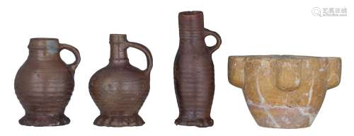 Three 15th/16thC Rhineland brown glazed stoneware jugs, H 16...