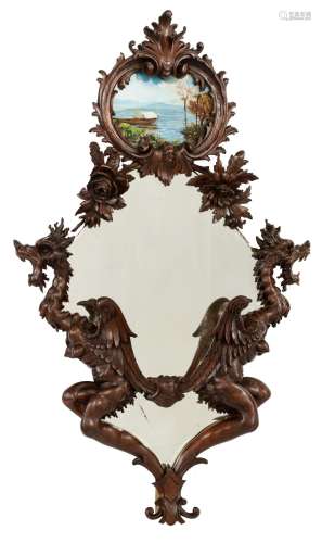 A Rococo style mirror, with on top an églomisé marine view, ...