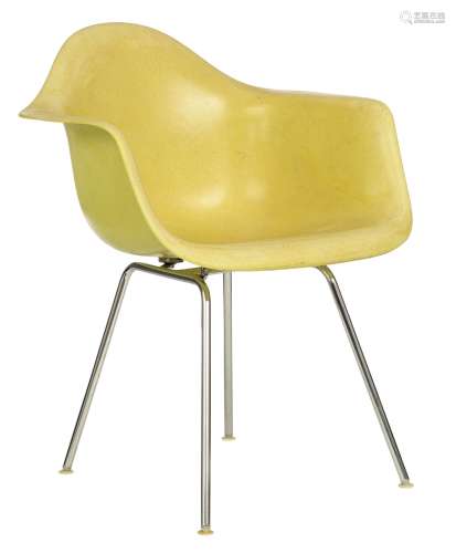 A vintage Eames lemon yellow fibreglass PAC armchair, Herman...