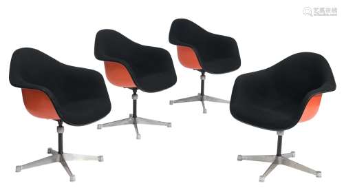 A set of four Eames PAC swivel armchairs, by Herman Miller, ...