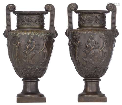 A pair of Neoclassical basso-relievo patinated bronze urns, ...