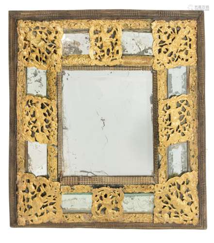A Baroque wall mirror, with gilt and openworked brass fittin...
