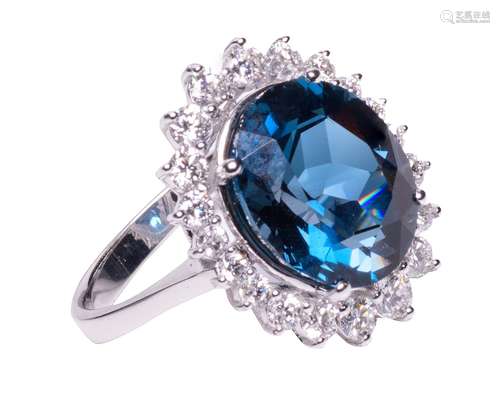 An 18ct white gold ring, central set with a London Blue Topa...