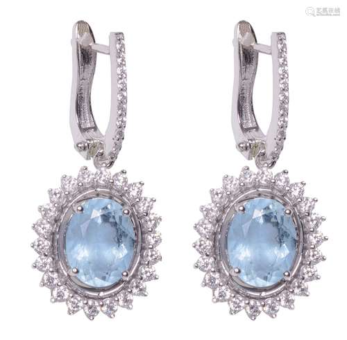 A pair of 18ct white gold earrings set with aquamarine and 6...