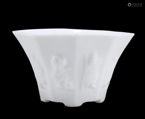 A CHINESE BLANC DE CHINE LIBATION CUP, the octagonal