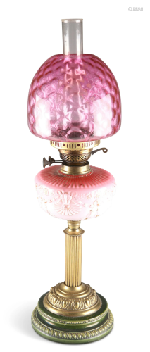 A VICTORIAN POTTERY AND BRASS OIL LAMP, with reeded