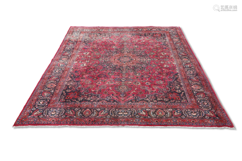 A LARGE PERSIAN MASHAD CARPET, the raspberry field with