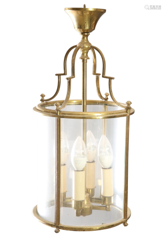 A PERIOD STYLE FOUR-GLASS BRASS HANGING LANTERN, of