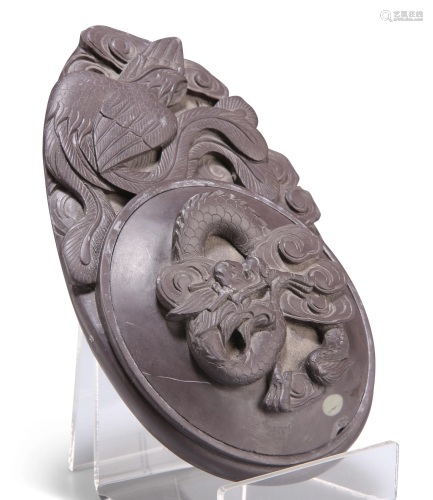 A CHINESE INKSTONE, 19TH CENTURY, the circular cover
