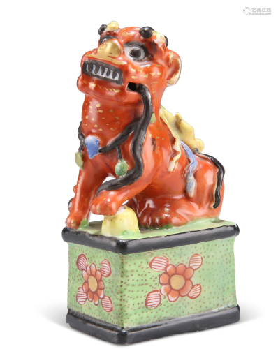 A CHINESE CLOBBERED MODEL OF A FOO DOG, 19TH CEN…