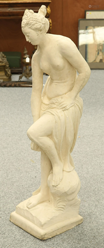 A COMPOSITION STATUARY FIGURE, modelled as a scantily