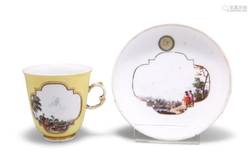AN 18TH CENTURY MEISSEN YELLOW GROUND CUP AND SAUCER,