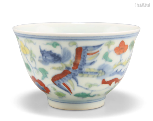 A CHINESE DOUCAI CUP, painted with phoenix and foliage,