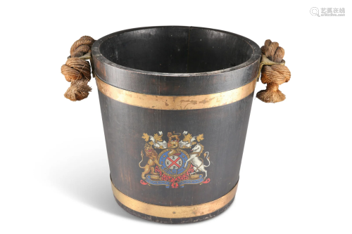 A BRASS-BOUND COOPERED OAK FIRE BUCKET, with