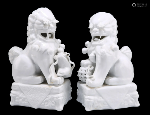 A NEAR PAIR OF CHINESE BLANC DE CHINE MODELS OF