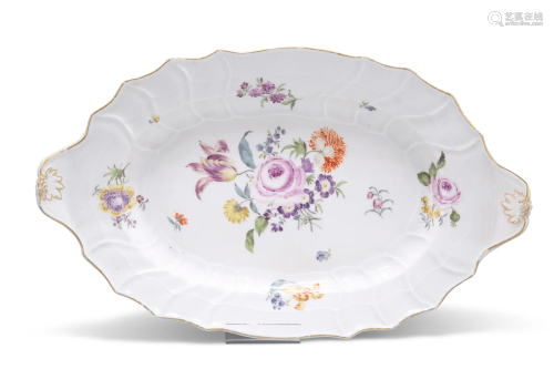 A MEISSEN DISH, CIRCA 1750, shaped oval, painted with