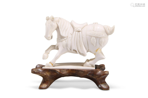 A CHINESE IVORY CARVING OF A HORSE, 19TH CENTURY, on a