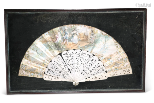 A 19TH CENTURY FRENCH CARVED IVORY FAN, the sticks and