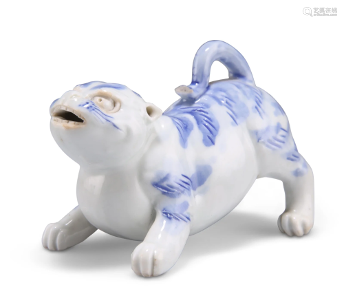 A JAPANESE HIRADO BLUE AND WHITE MODEL OF A DOG, MEIJI