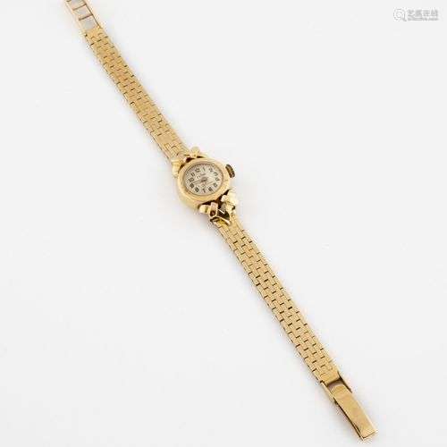 Montre bracelet de dame en or jaune (750). Boîtie…