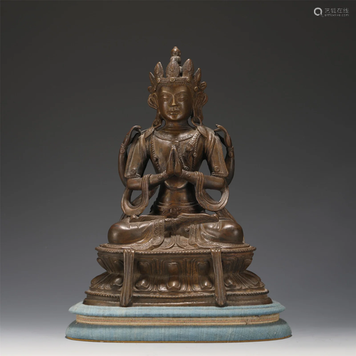 A BRONZE CROWNED BUDDHA