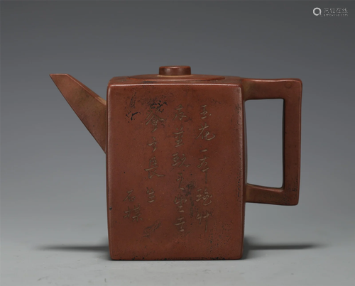 A YIXING GLAZED TEAPOT