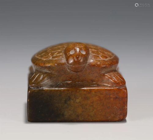 A CARVED TORTOISE SHAPE STONE SEAL