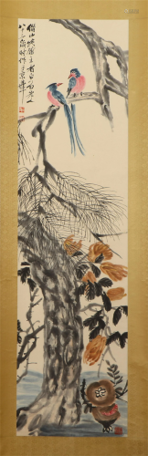 A CHINESE PAINTING OF BIRDS ON BRANCH