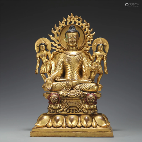 A GILT-BRONZE BUDDHA WITH ACOLYTES