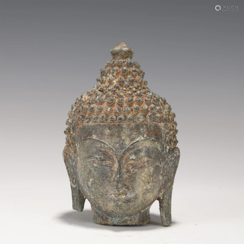 A BRONZE BUDDHA HEAD