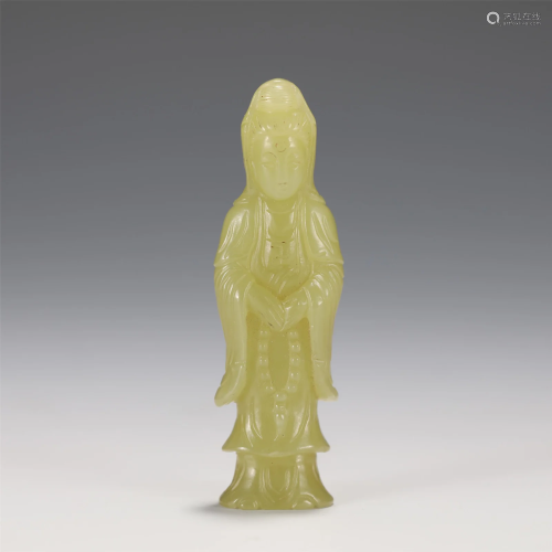 A CARVED YELLOW JADE PENDANT