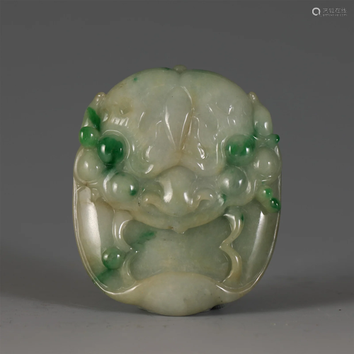 A CARVED JADEITE PANEL