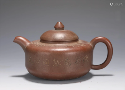 A YIXING GLAZED TEAPOT