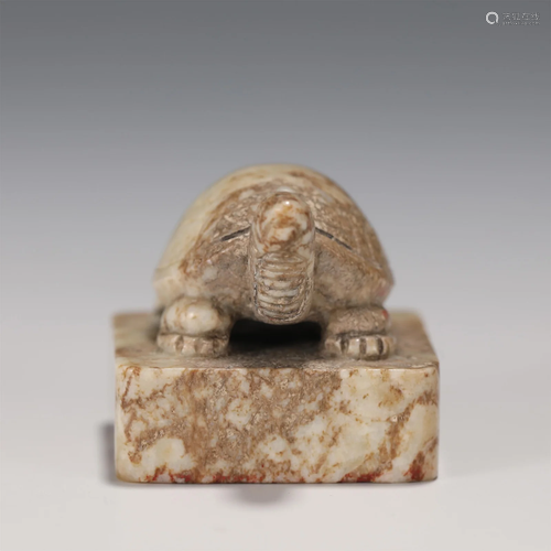 A CARVED TORTOISE SHAPE STONE SEAL