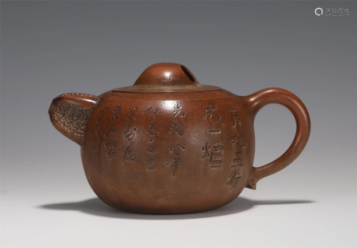 A YIXING GLAZED TEAPOT