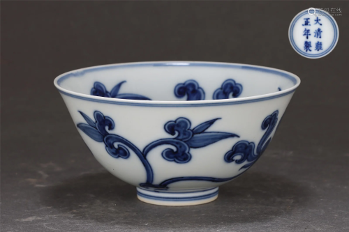 A BLUE AND WHITE FLORAL SCROLL BOWL