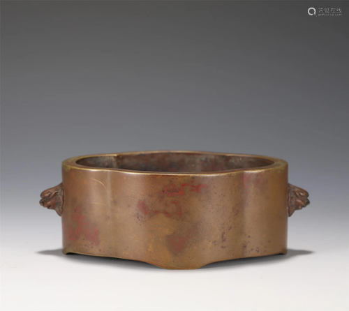 A BRONZE CENSER WITH DOUBLE HANDLES