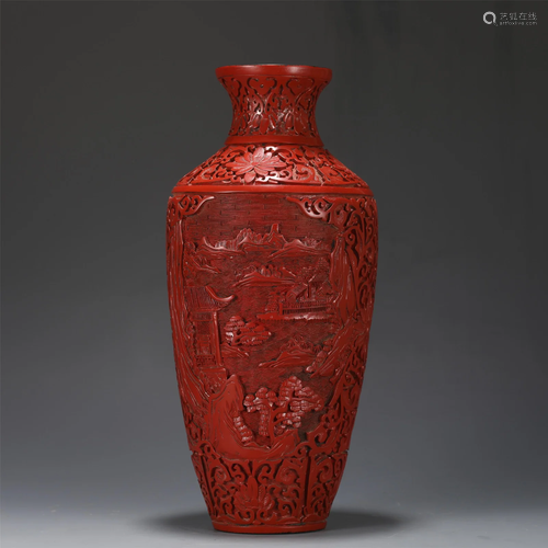 A CARVED CINNABAR LACQUER VASE