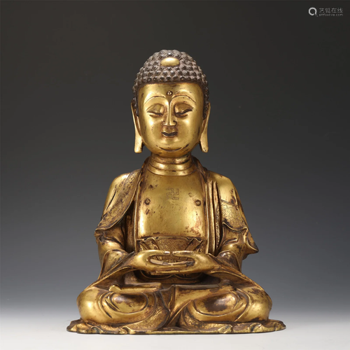 A GILT-BRONZE SEATED SHAKYAMUNI