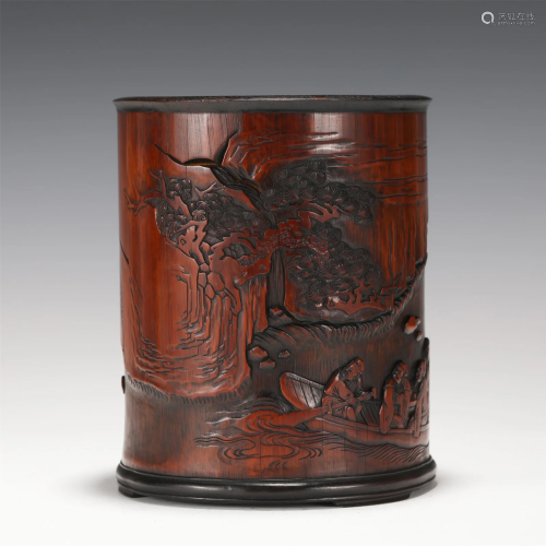 A CARVED BAMBOO FIGURAL AMONG LANDSCAPE BRUSHPOT