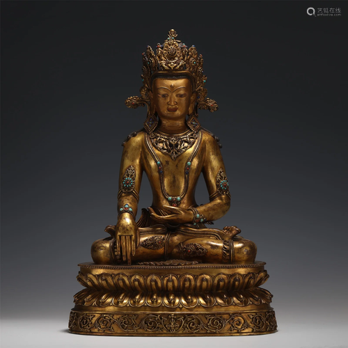 A HARDSTONES INLAID GILT-BRONZE CROWNED BUDDHA