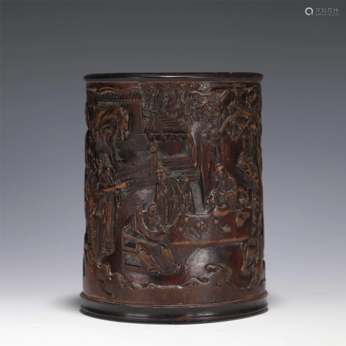 A CARVED ALOESWOOD FIGURAL BRUSHPOT