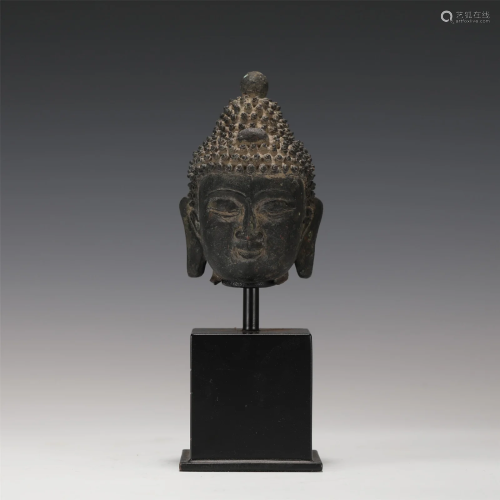 A BRONZE BUDDHA HEAD